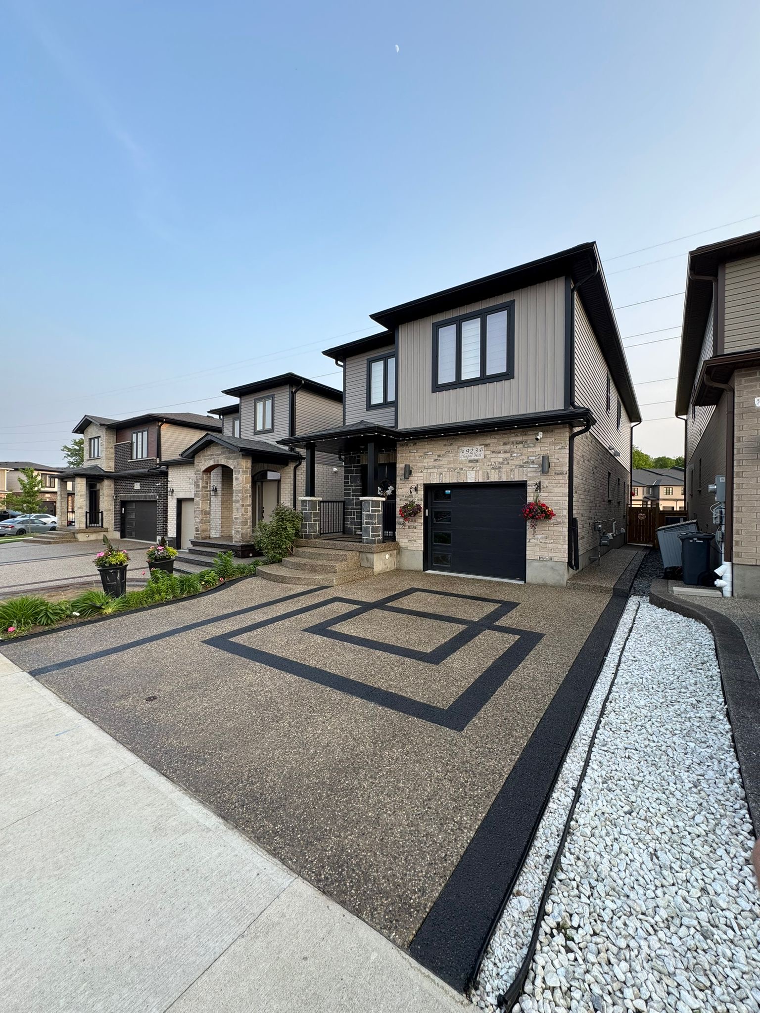 Custom concrete patio for residential backyard in Guelph Ontario